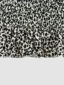 Jupe Courte Volantée à Motifs -Kiabi jupe courte volantee a motifs blancnoir arr18 1 frb5 1